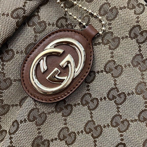 Gucci Sukey tote with brown leather trim
Length: 13.5" 
Height: 9.5"
Drop: 6" - Picture 2 of 10